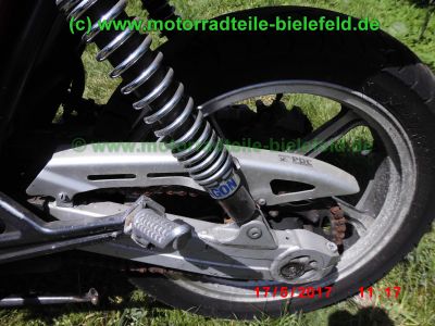 Kawasaki_ZR550B_Zephyr_rot_Gepaecktraeger_HAGON_Federbeine_48PS_Drosselung_Alpha-Technik-80.jpg