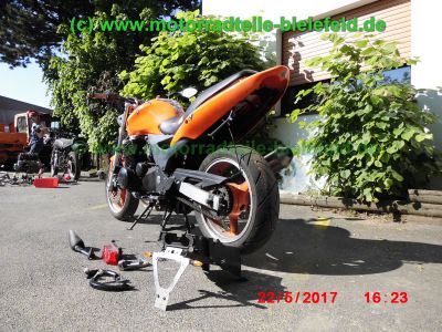 Kawasaki_ZR-7_ZR7_S_ZR750F_48PS_u_76PS_orange_Streetfighter_Superbike-Lenker_Doppel-Scheinwerfer_KOSO-Tacho_Sport-Auspuff_TAKKONI_mit_dB-Killer_Magura_Bremse-3.jpg