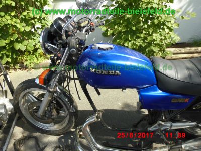 Honda_CB750KZ_RC01_EZ79_blau_teilzerlegt_original_4-4_Auspuff_Sankei_2043_-_Teile_Ersatzteile_parts_spares_spare-parts_ricambi_repuestos_wie_CB_750_900_KZ_F_F2_Boldor_RC04_SC01_SC09-11.jpg
