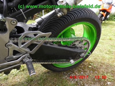 Kawasaki_ZXR_750_L_ZX750L_gruen_nackt_Regenreifen_Rennstrecke_race_track-_Teile_Ersatzteile_parts_spares_spare-parts_ricambi_repuestos_wie_ZXR750M_ZX750M-13.jpg