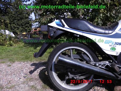 Kawasaki_GPZ305_weiss-blau_EX305B_Halbschale_Belt-Drive_Riemen-Antrieb_original_Auspuff_2-2_KHI_K_070_–_wie_ER_EX_Z_250_305_A_B_GP-54.jpg