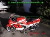 Kawasaki_ZX-10_Tomcat_ZXT00B_rot-weiss_139PS_260kmh_unverbastelt_original_Auspuff_KHI_K177_Gepaecktraeger_–_Technik_wie_GPZ1000RX_ZXT00A_GPZ900R_ZX900A-1.jpg