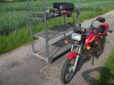 Honda_CG_125_CG125_JC27__rot_teilzerlegt_neue_Motorteile_CB_CBF_CBZ_CBX_125_4.jpg