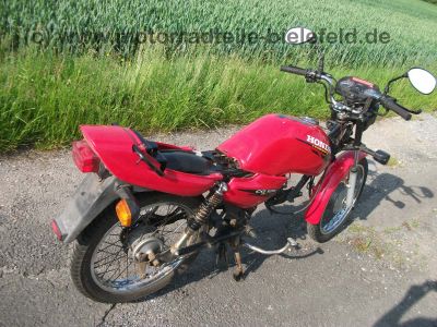 Honda_CG_125_CG125_JC27__rot_teilzerlegt_neue_Motorteile_CB_CBF_CBZ_CBX_125_82.jpg