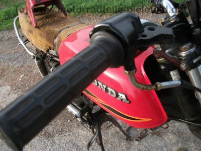 Honda_CB_125_T_Twin_Speiche_rot_teilzerlegt_-_wie_CB_CM_125_185_250_K_T_Twin_C_82.jpg
