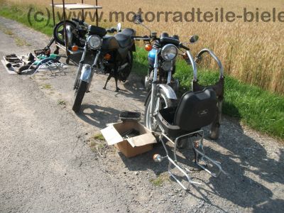Honda_CB_400_T_blau_orig__Auspuff_HM_413_414_Gepaecktraeger_-_wie_CB_CM_250_400_450_T_N_6.jpg