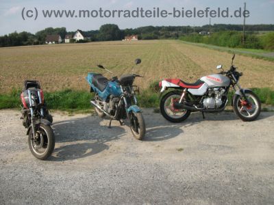 Suzuki_GSX_550_E_GN71D_schwarz-rot_CRASH_Motor_neu_-_wie_GSX_400_500_550_600_F_E_ES_EF_2.jpg
