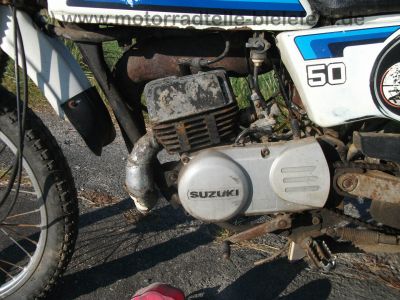 Suzuki_TS_50_ER_KT_XK_Enduro_Mokick_1_Hd__orig__Schluessel_und_Kaufbeleg_aus_1980_-_wie_RG_ZR_TS_GT_RM_50_70_80_90_100_125_ER_X_XK_12.jpg