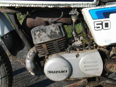 Suzuki_TS_50_ER_KT_XK_Enduro_Mokick_1_Hd__orig__Schluessel_und_Kaufbeleg_aus_1980_-_wie_RG_ZR_TS_GT_RM_50_70_80_90_100_125_ER_X_XK_24.jpg