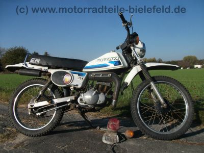 Suzuki_TS_50_ER_KT_XK_Enduro_Mokick_1_Hd__orig__Schluessel_und_Kaufbeleg_aus_1980_-_wie_RG_ZR_TS_GT_RM_50_70_80_90_100_125_ER_X_XK_67b.jpg