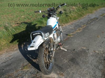 Suzuki_TS_50_ER_KT_XK_Enduro_Mokick_1_Hd__orig__Schluessel_und_Kaufbeleg_aus_1980_-_wie_RG_ZR_TS_GT_RM_50_70_80_90_100_125_ER_X_XK_70.jpg