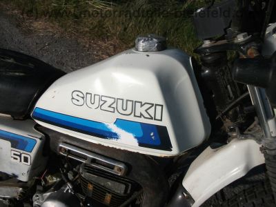 Suzuki_TS_50_ER_KT_XK_Enduro_Mokick_1_Hd__orig__Schluessel_und_Kaufbeleg_aus_1980_-_wie_RG_ZR_TS_GT_RM_50_70_80_90_100_125_ER_X_XK_76.jpg