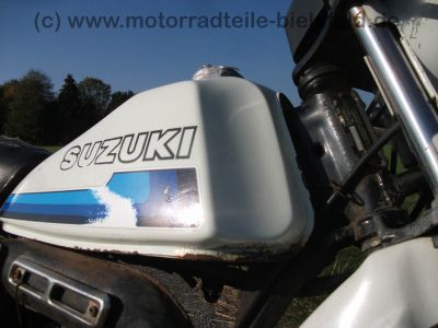 Suzuki_TS_50_ER_KT_XK_Enduro_Mokick_1_Hd__orig__Schluessel_und_Kaufbeleg_aus_1980_-_wie_RG_ZR_TS_GT_RM_50_70_80_90_100_125_ER_X_XK_84.jpg