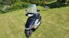 Honda_SJ_100_BALI_100_EX_HF07_Motor-Roller_Scooter_-_wie_FES_125_Bali_50_4.jpg
