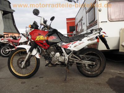 Honda_NX650_Dominator_RD08_rot-weiss_e6_Marving-Auspuff_1-2_Sturzbuegel_-_RFVC-Motor_wie_XBR_GB_500_PC15_PC16_XL600_RM_LM_PD03_PD04_XR600R_PE04_1.jpg