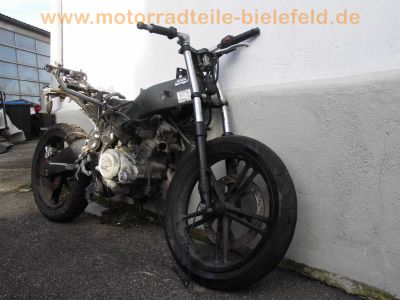 Yamaha_YZF-R_125_RE06_Crash_1a_Motor_Auspuff_mit_2x_Kat_offene_CDI_5D700_120_kmh_3.jpg