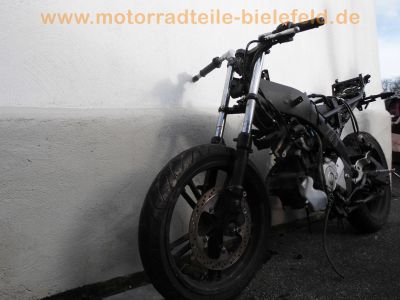 Yamaha_YZF-R_125_RE06_Crash_1a_Motor_Auspuff_mit_2x_Kat_offene_CDI_5D700_120_kmh_51.jpg